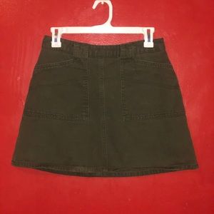 Green denim mini skirt
